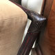 Rattan armchair and footrest