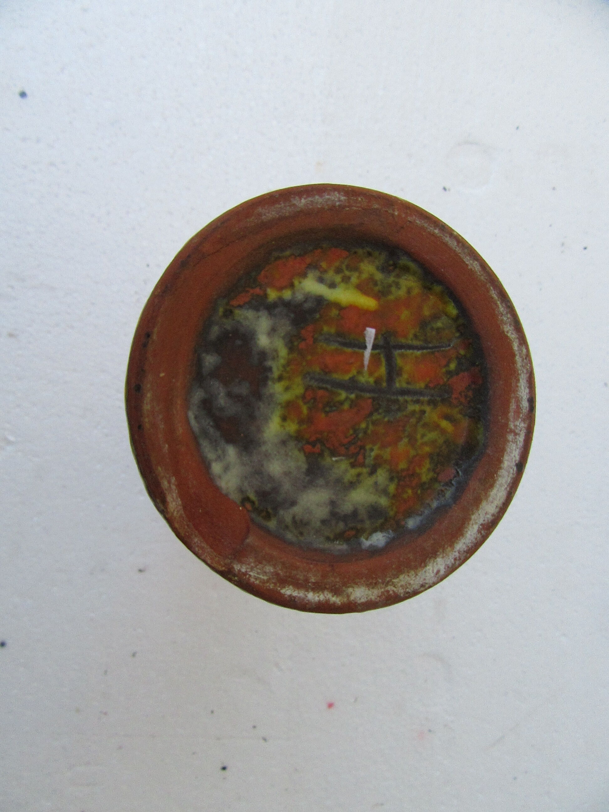 Orange red ceramic vase