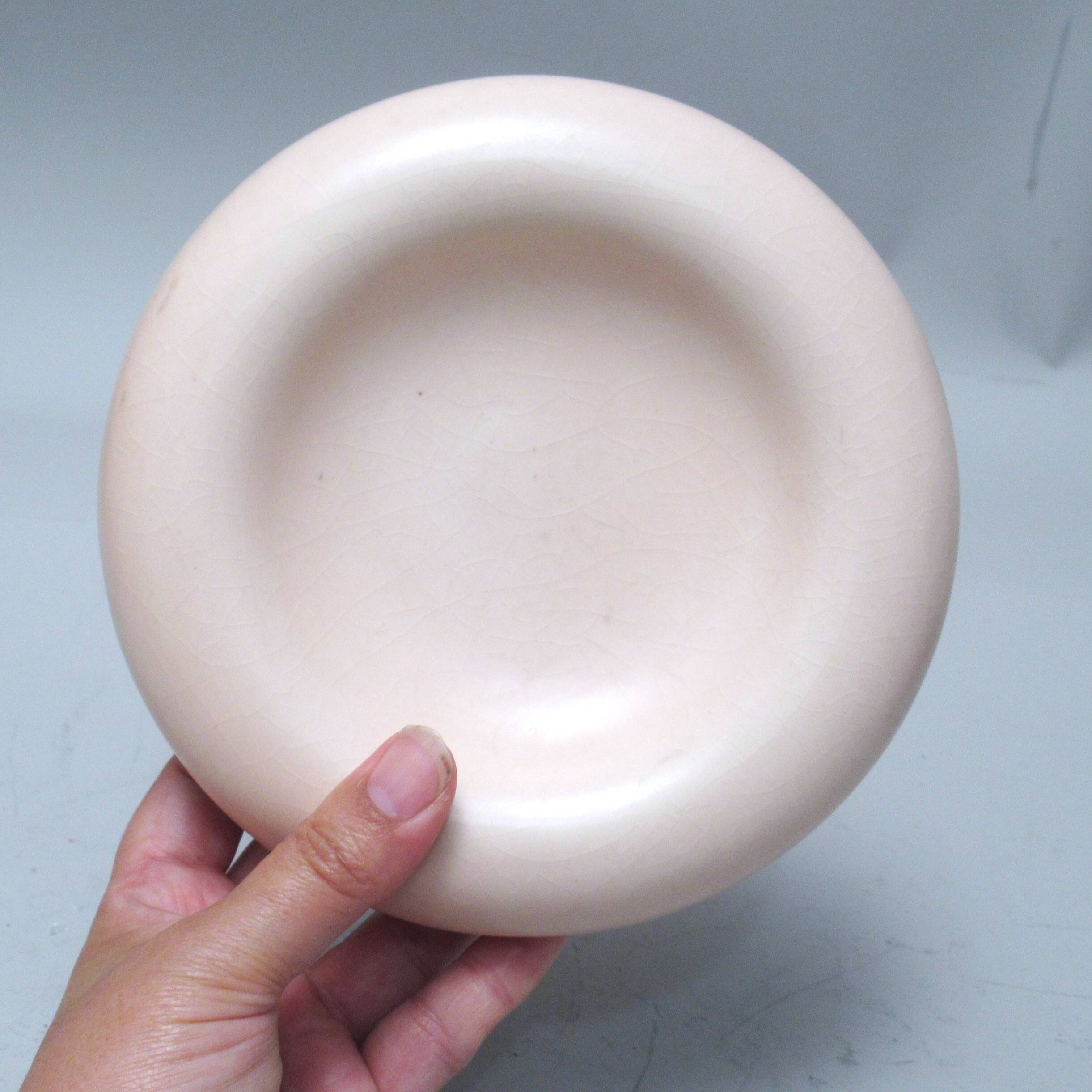 Pale pink ceramic ashtray from the 1980s.