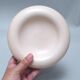 Pale pink ceramic ashtray from the 1980s.