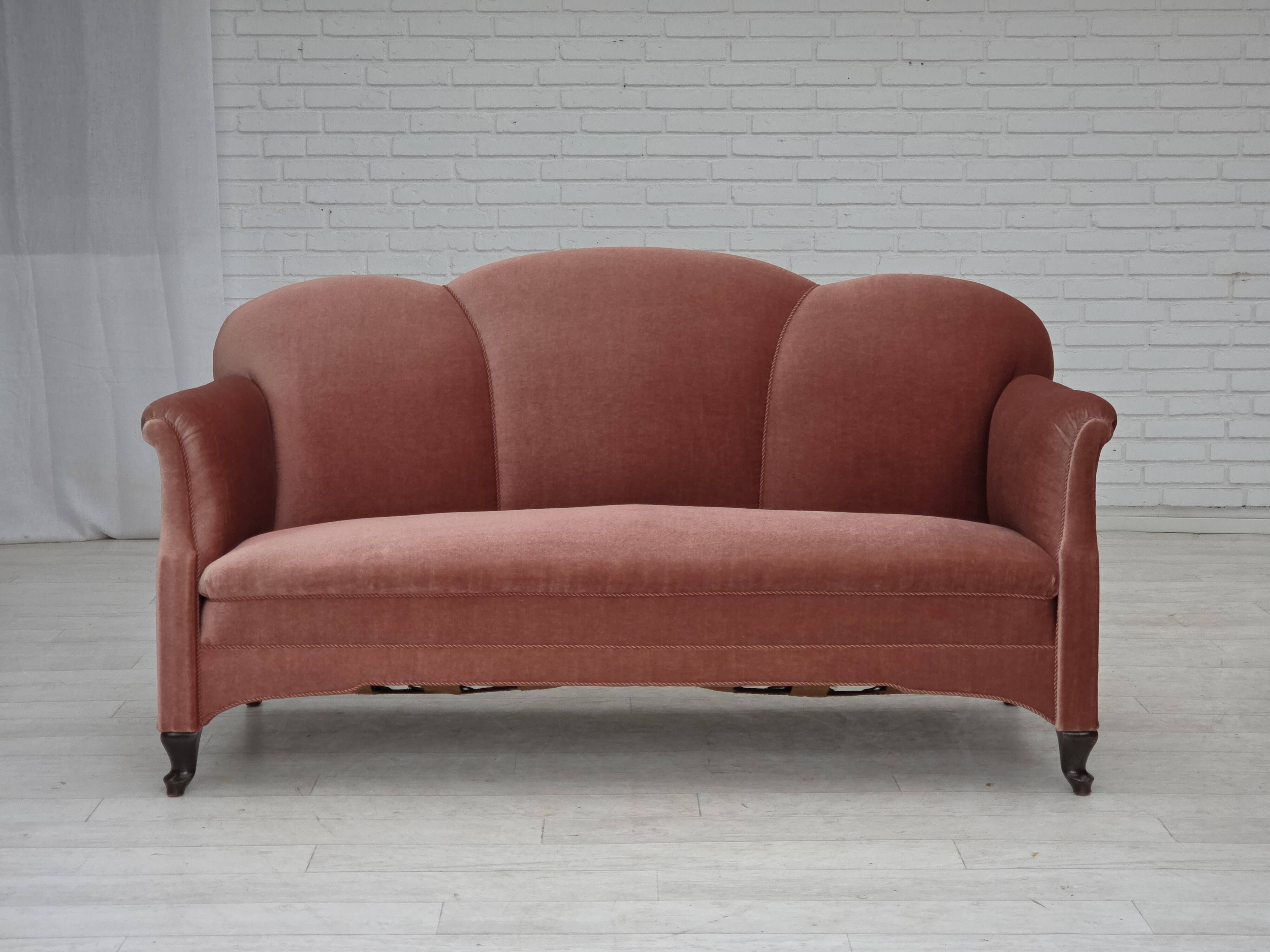 1950s, Danish 2-seater sofa, salmon pink furniture velour, oak wood legs.