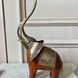 Wooden elephant and brass