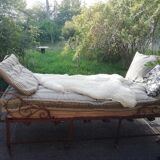 Old wrought iron folding bed