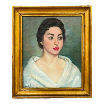 Old oil painting portrait of a woman from the 20th century