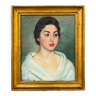 Old oil painting portrait of a woman from the 20th century