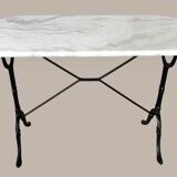 Oval marble and cast iron bistro table