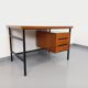 Vintage modernist double-sided desk in mahogany and black metal from the 1960s