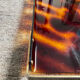 Vintage plateau in tortoiseshell lucite, Maison Mercier style.