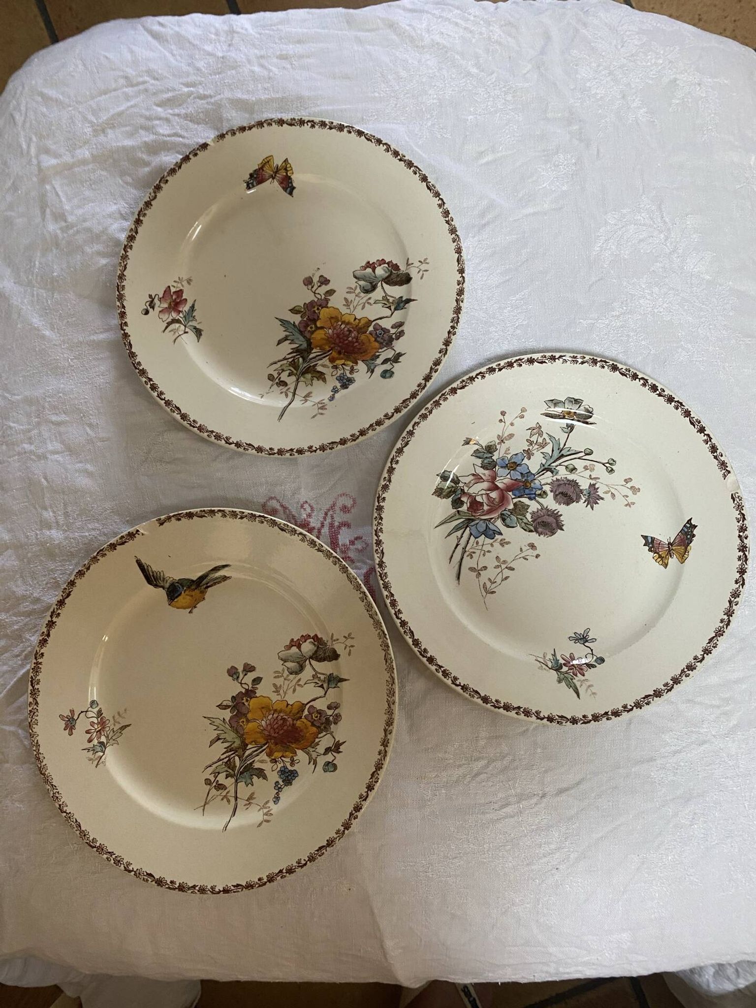 Set of 3 flat plates in polychrome ironstone E. Bourgeois