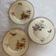 Set of 3 flat plates in polychrome ironstone E. Bourgeois