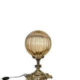 Bronze lamp and amber globe circa 1900