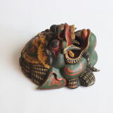 Two polychrome painted and gold leaf gilded Barong dance masks from Bali, Indonesia.