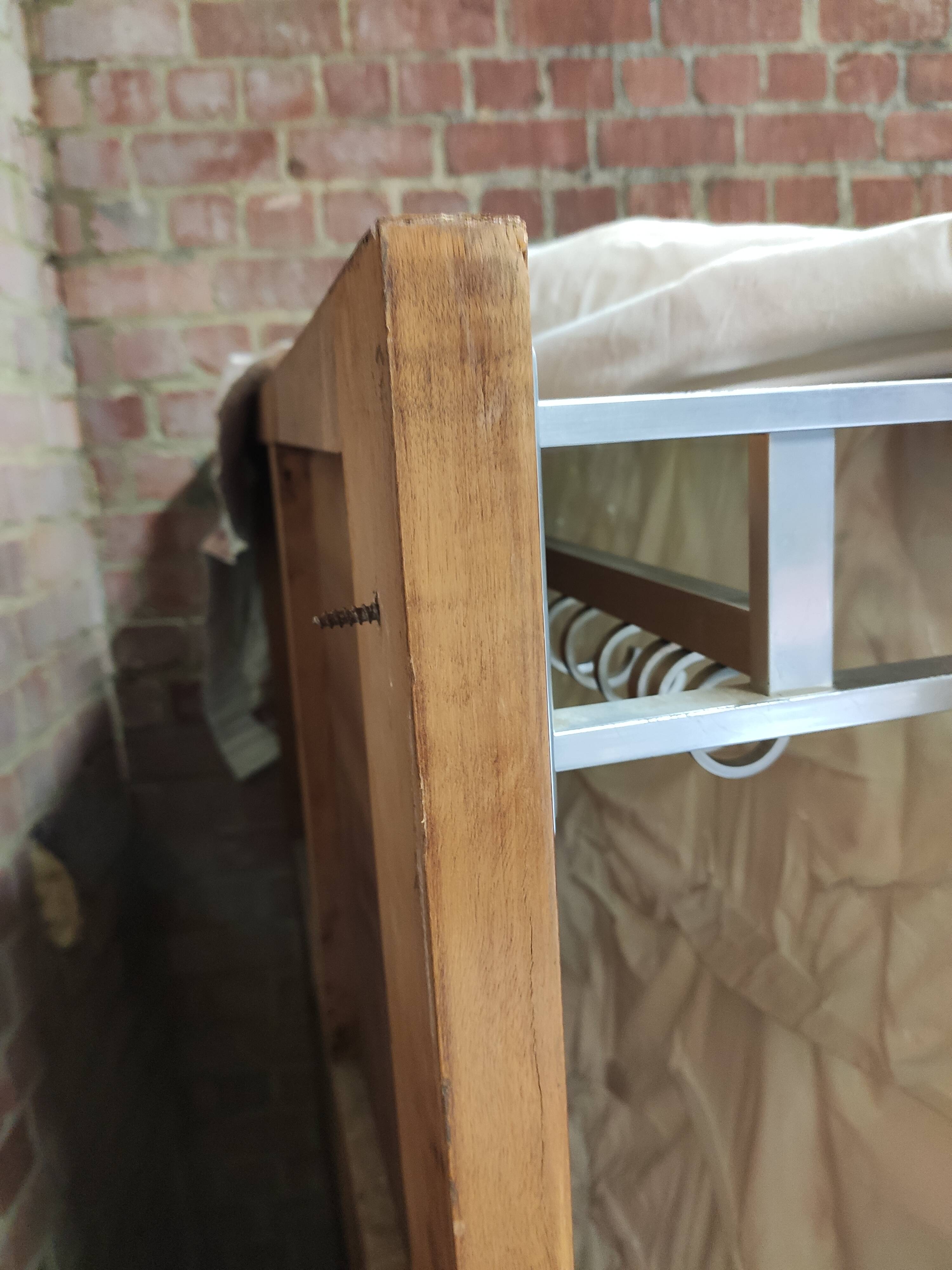 Modernist wall-mounted cloakroom in teak