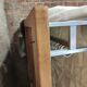 Modernist wall-mounted cloakroom in teak