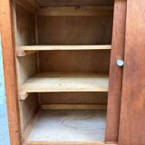 Vintage sideboard with sliding doors