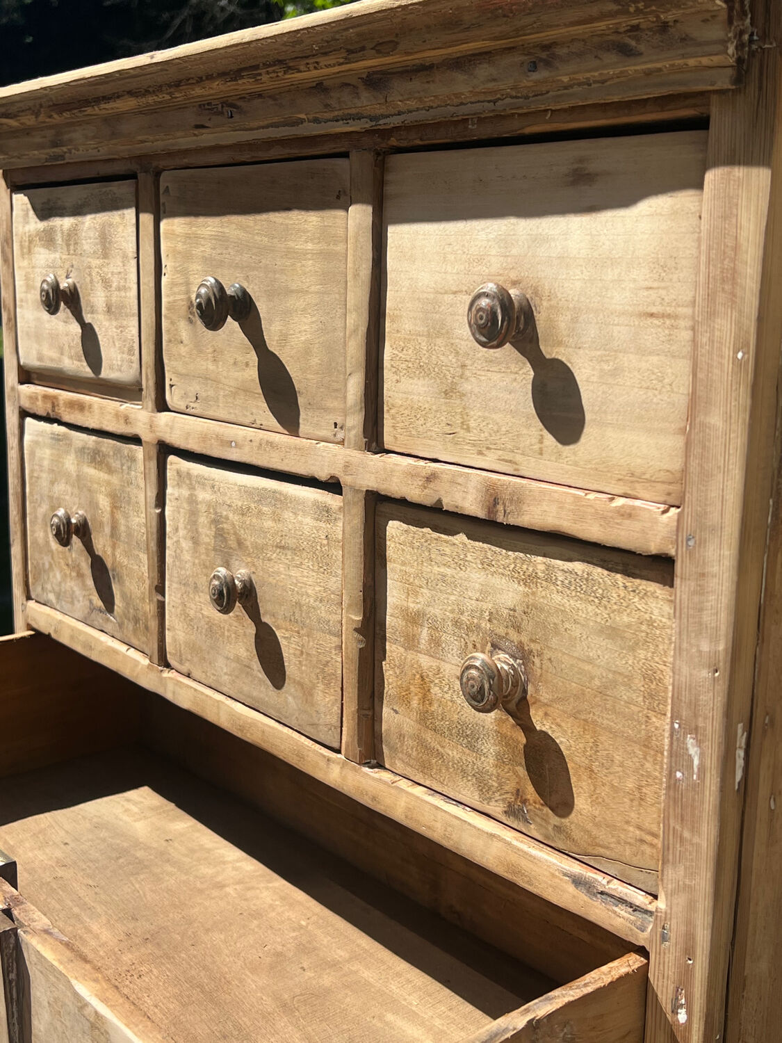 Beautiful piece of furniture with 8 drawers/2 doors in raw wood.