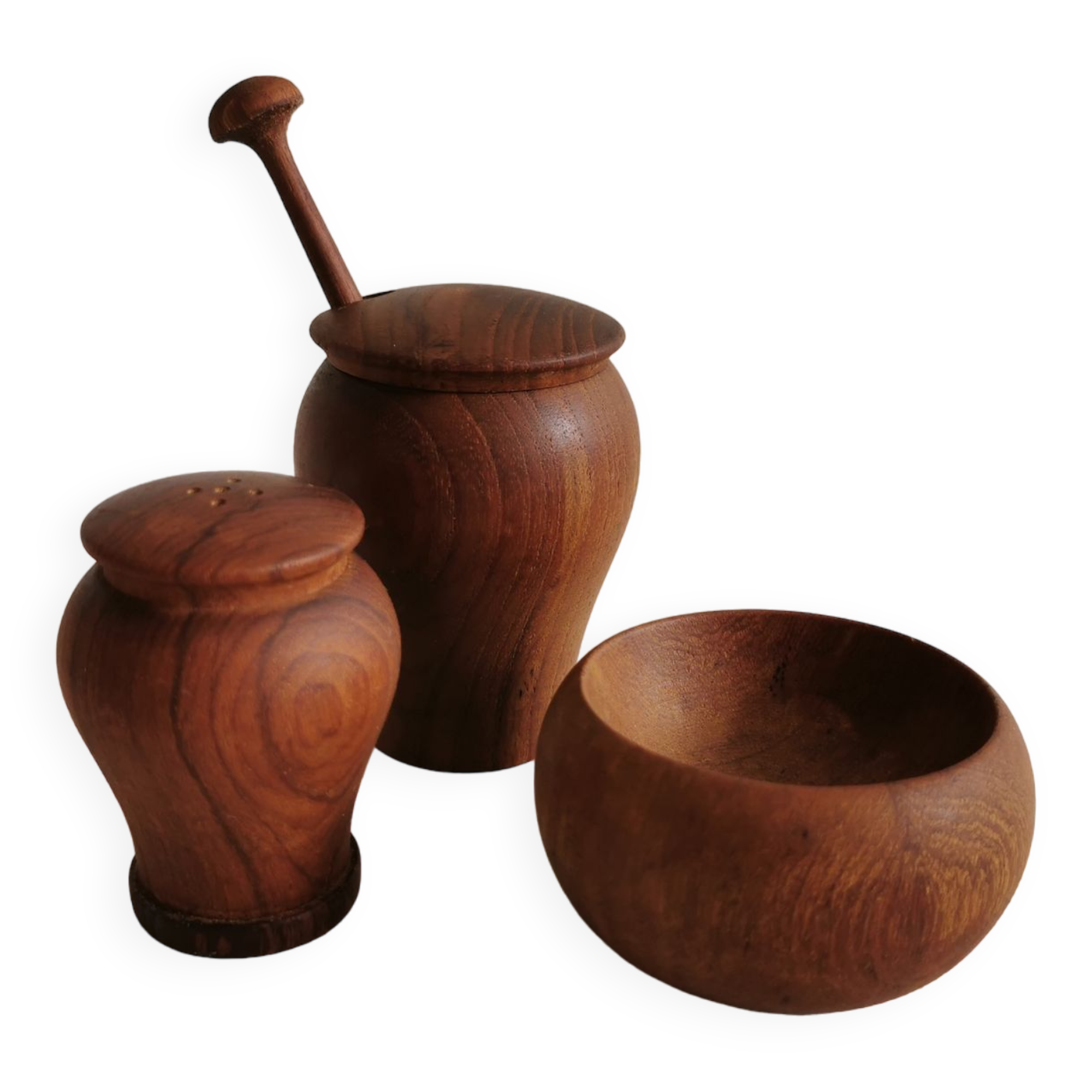 Small, beautiful lot consisting of a salt cellar, pepper shaker and honey jar.