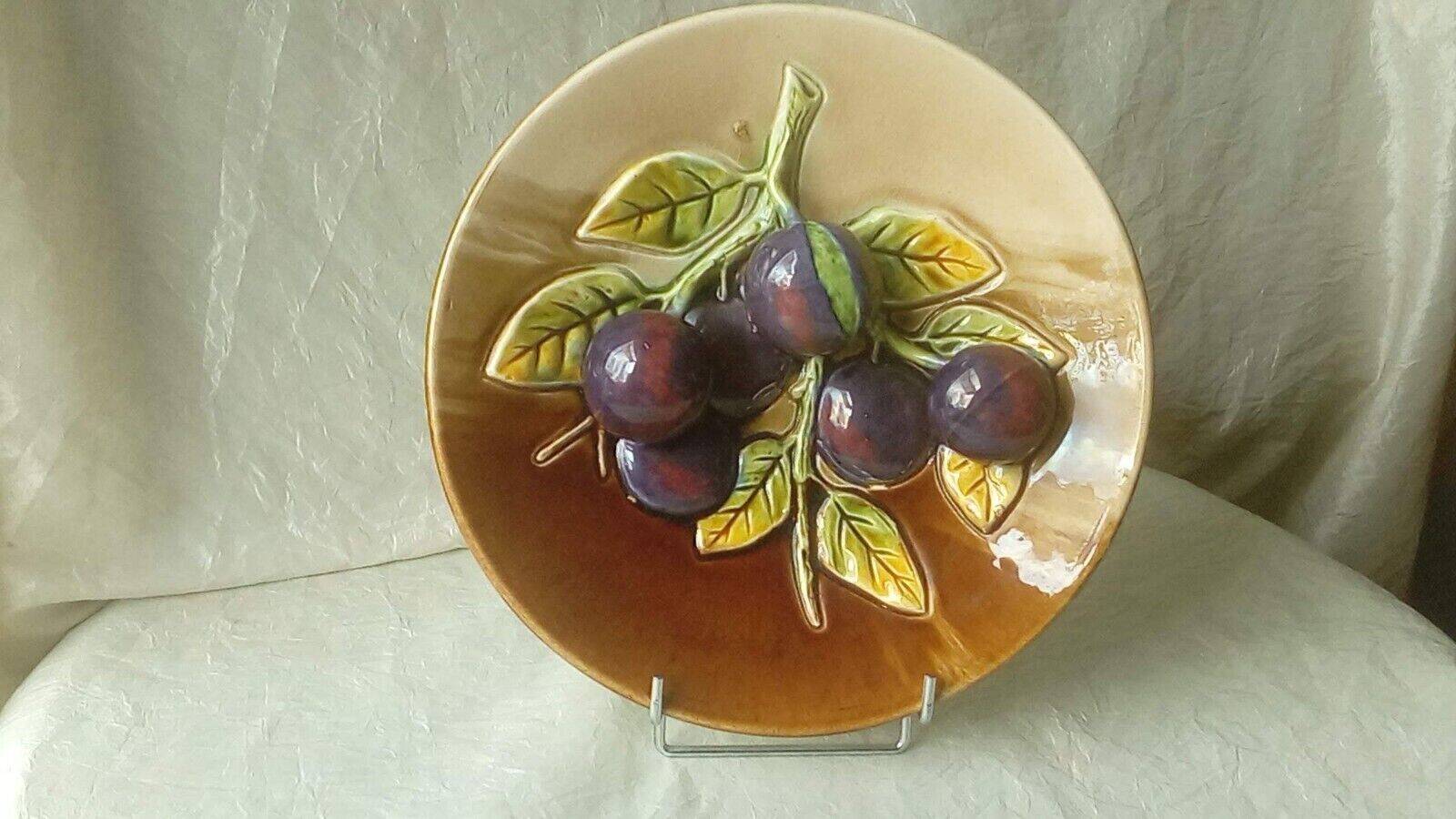 Ceramic plate barbotine trome eye plum late 19th