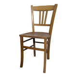 Antique patinated wooden bistro chair from the early 20th century.