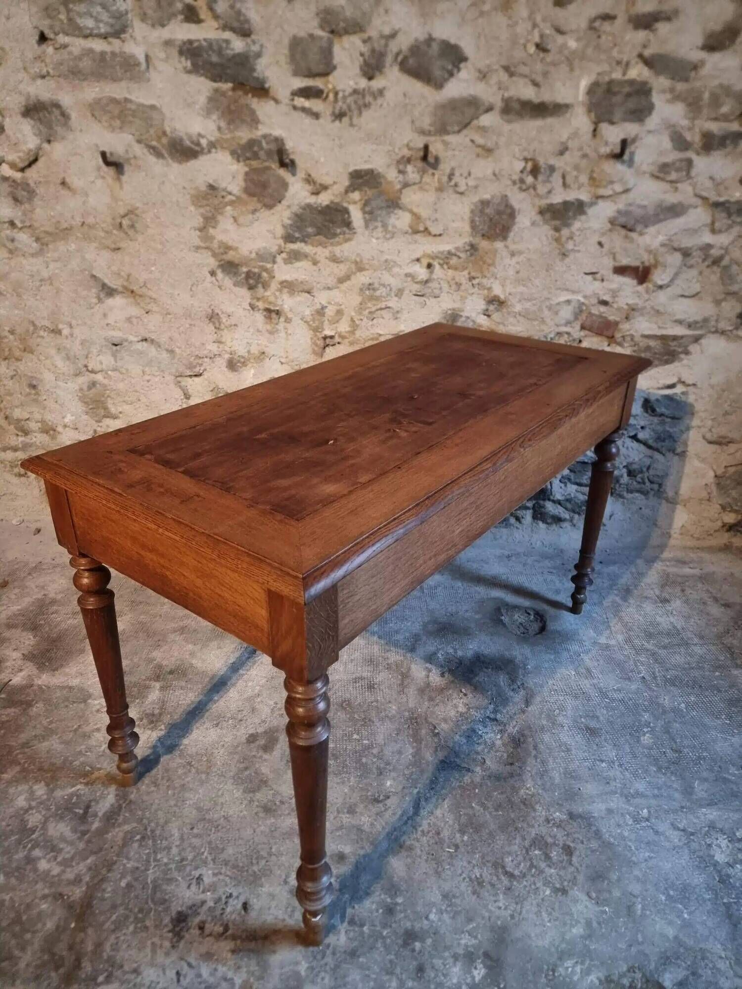 Antique French writing desk in oak with two drawers, 1920s.