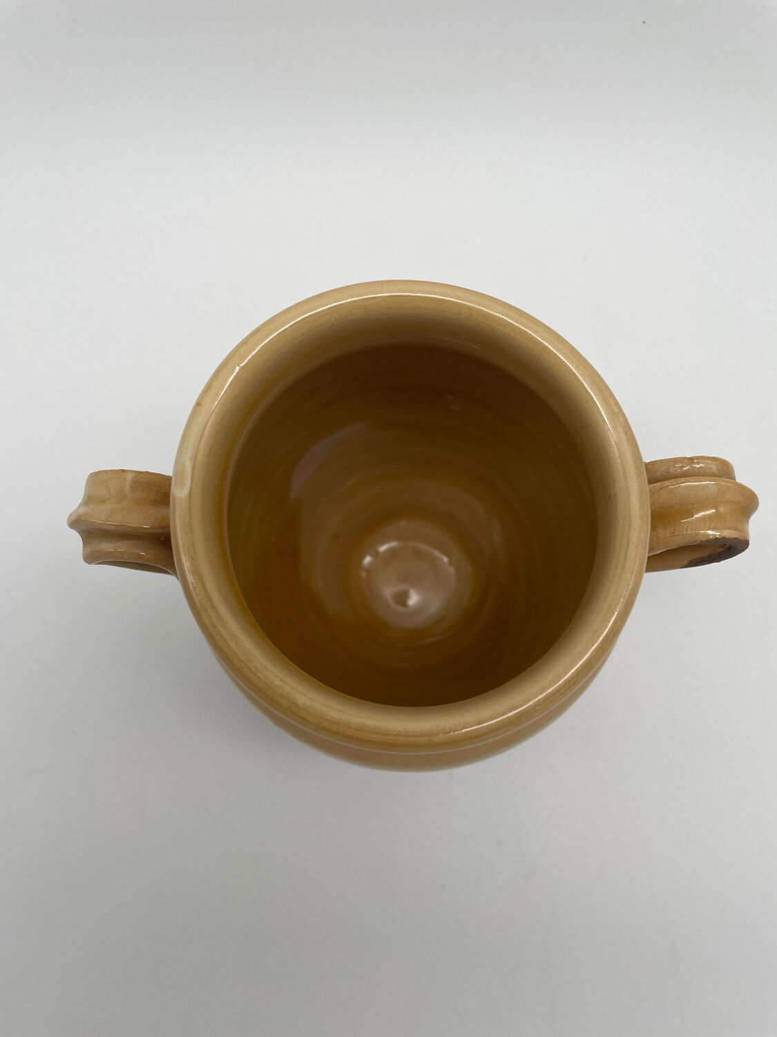 Varnished yellow terracotta confit pot