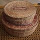 Nesting boxes made of straw.