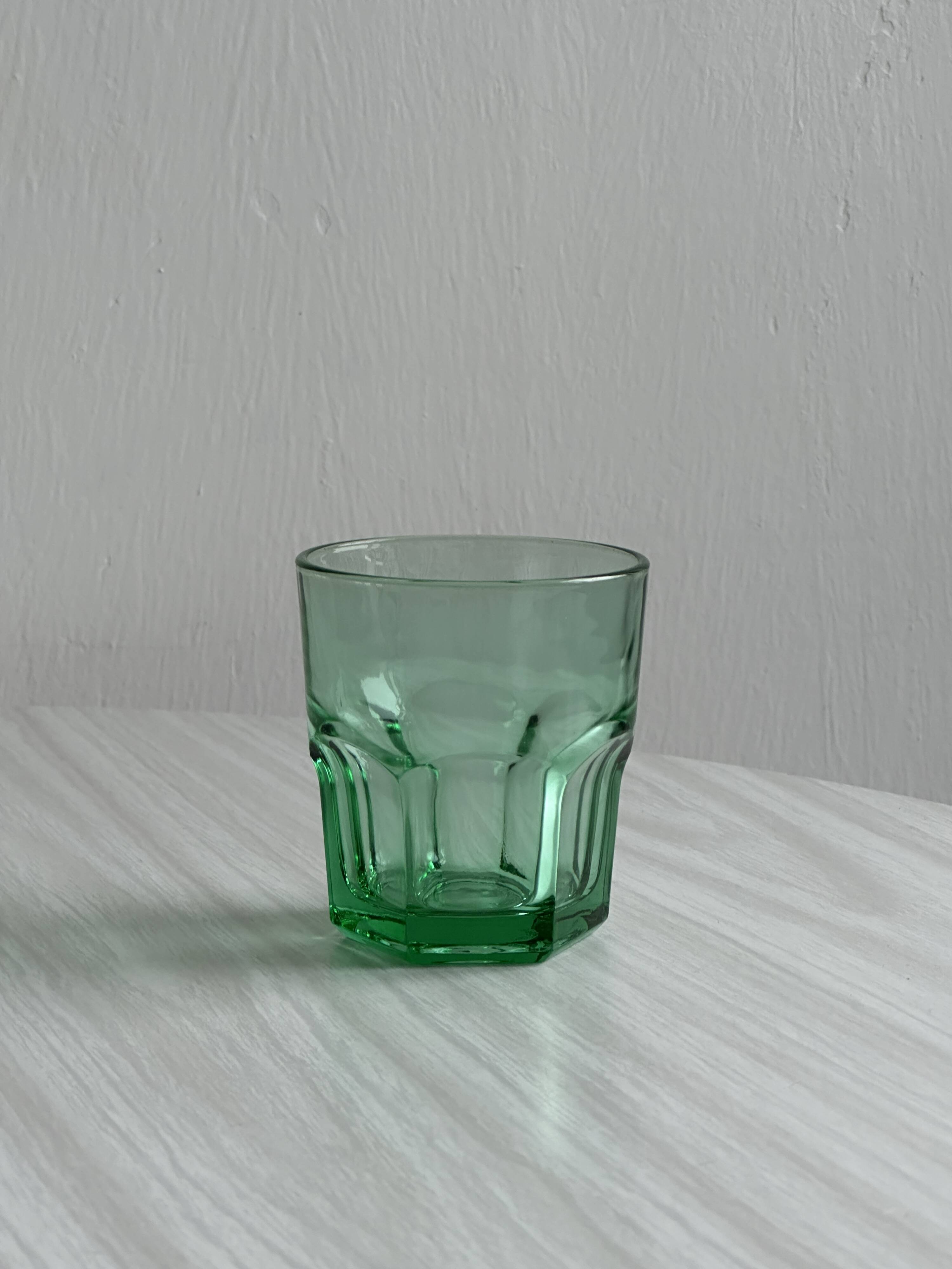 4 vintage water glasses in translucent green glass