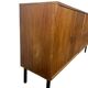 Vintage wooden sideboard with black steel legs.