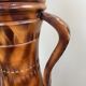 Important carved wooden jar