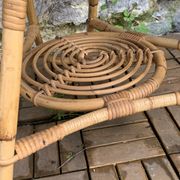 Pair of tripod coffee tables in rattan from the 1950s.
