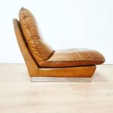 70s lounge chair in camel leather
