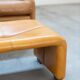 Pair of armchairs with cognac-colored pouf, "Coronado" model by Afra & Tobia scarpa for B&B It