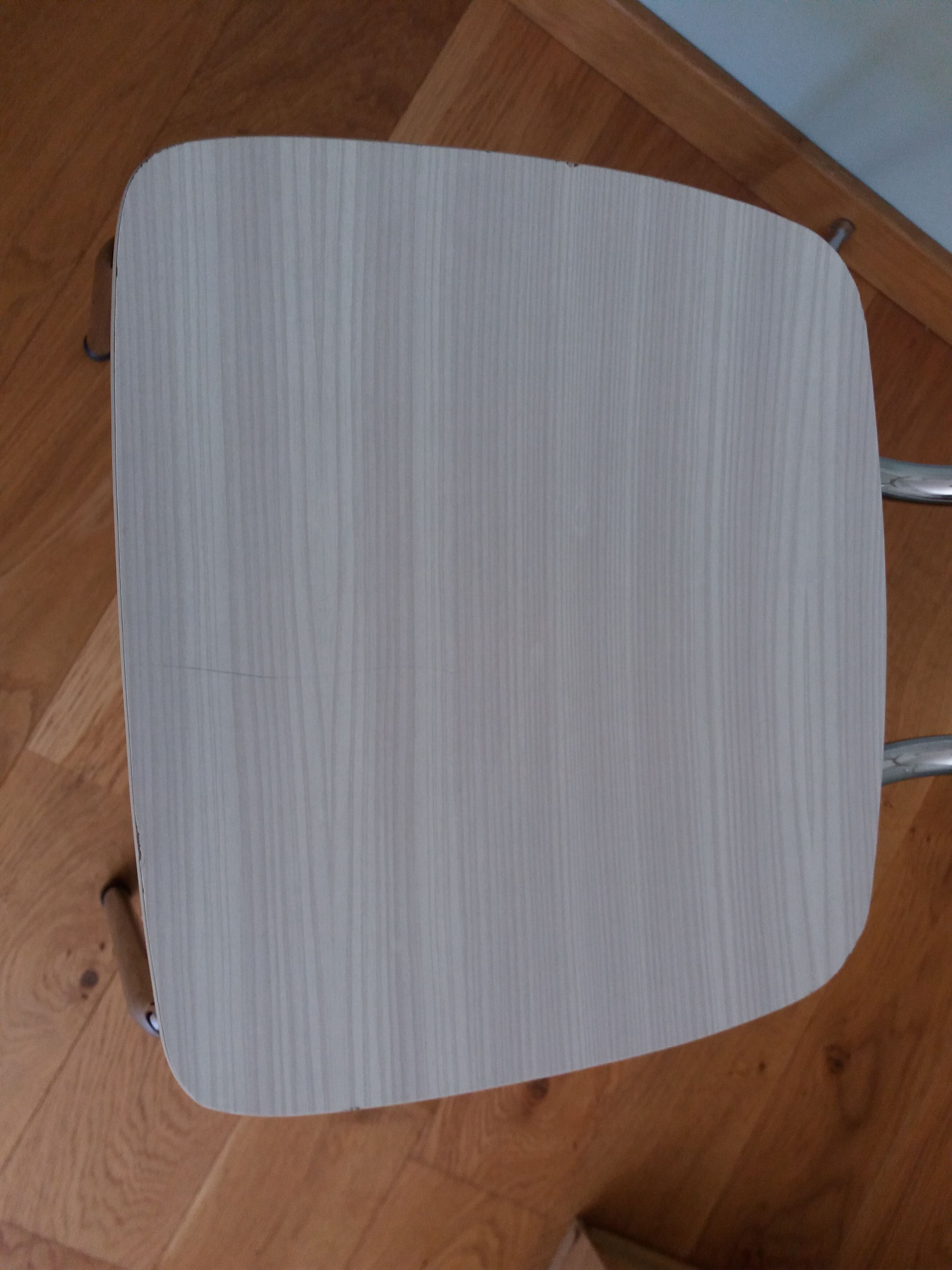 Chrome metal chair and formica white striped gray