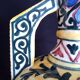 Art Deco ceramic vase with brightly colored abstract patterns
