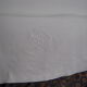 Old sheet in monogram white thread