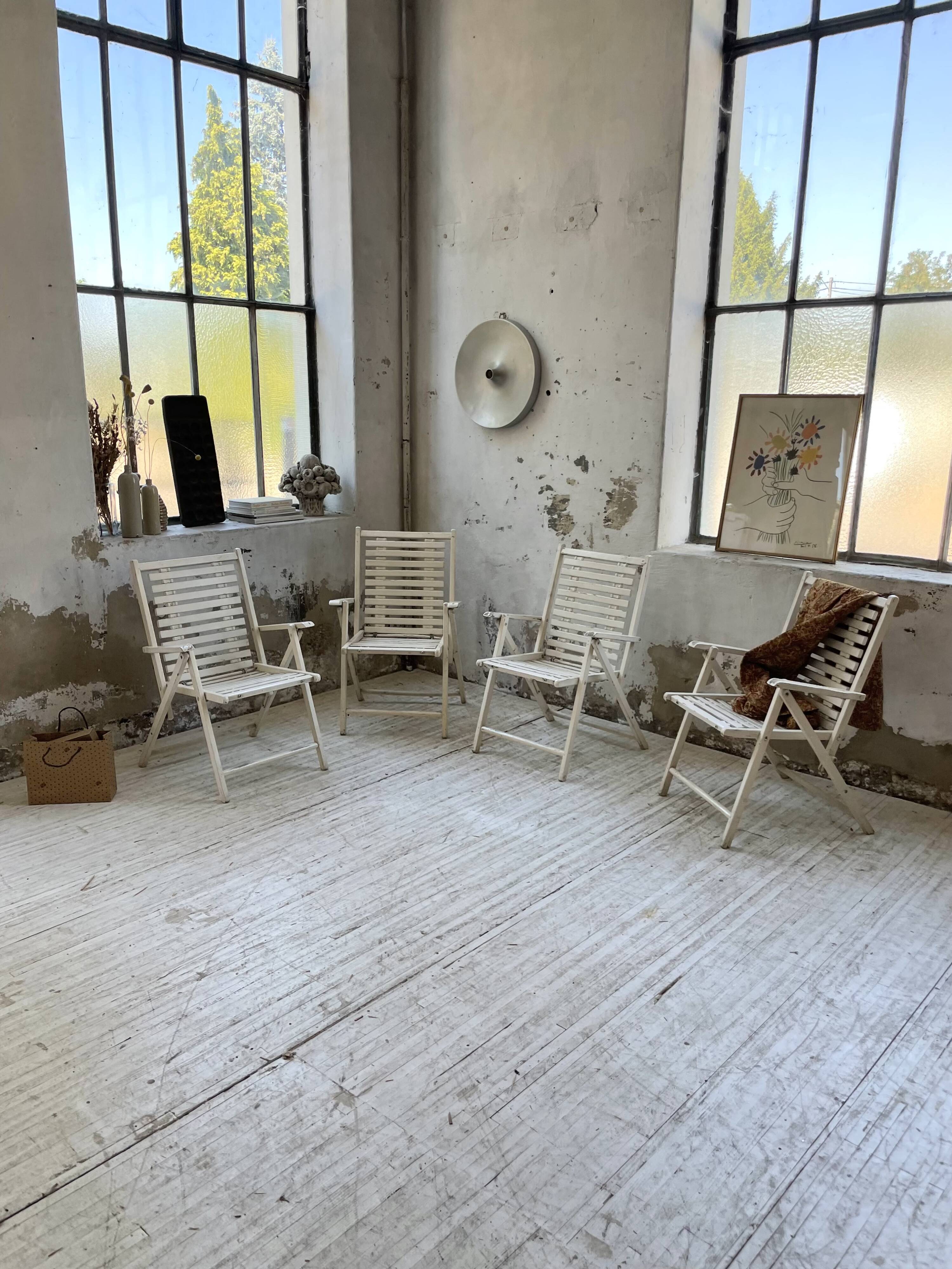 4 white wooden garden chairs
