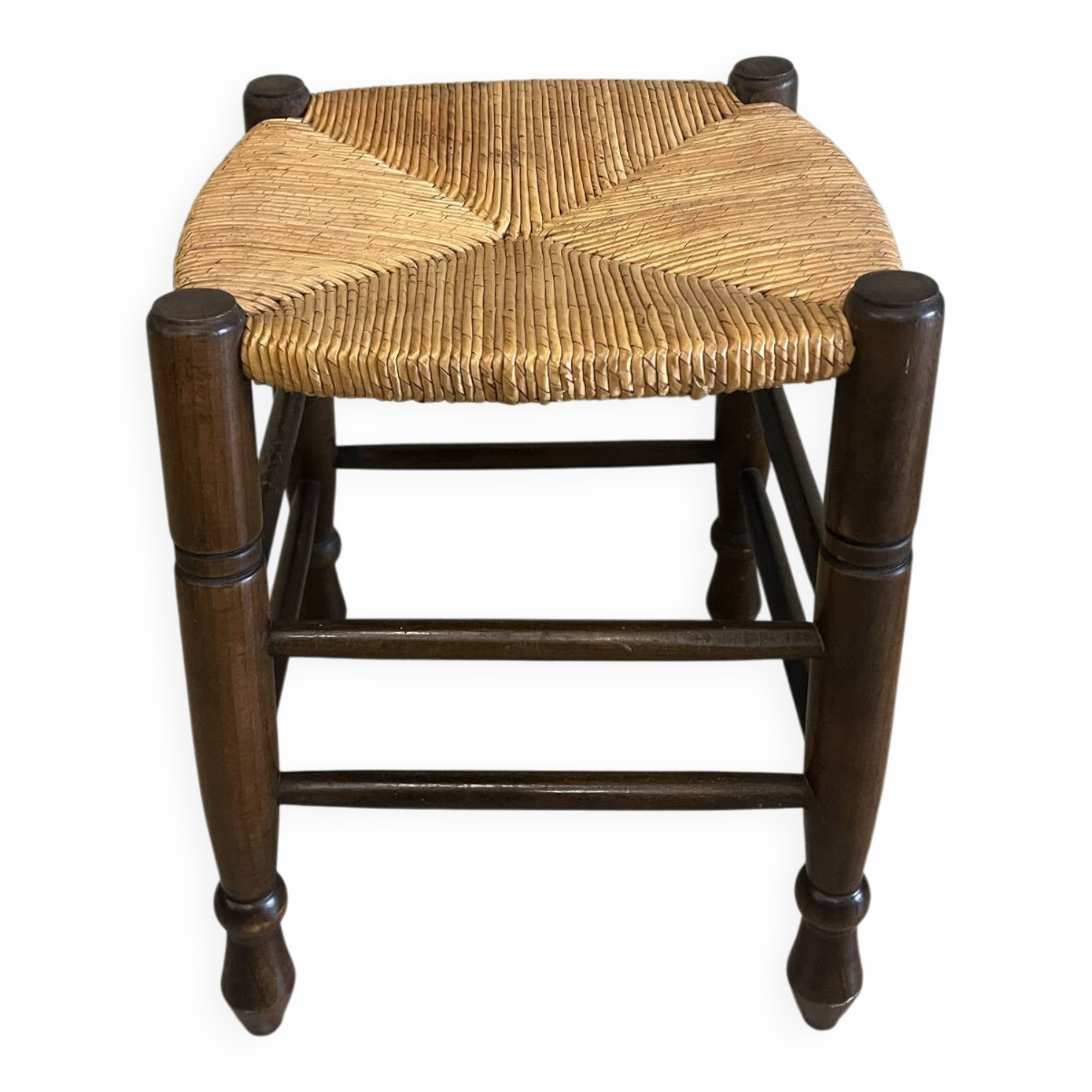 Wooden stool with a straw seat