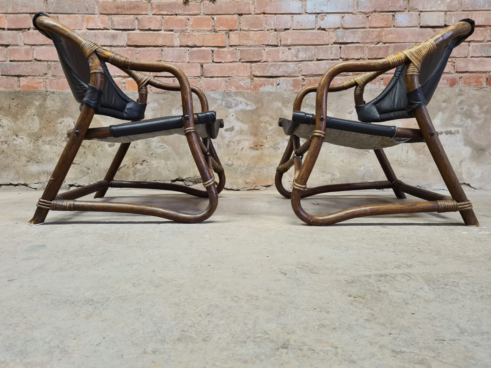 Pair of vintage skaï bamboo armchairs