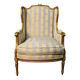 Louis XVI style gilt wood wingback armchair