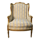 Bergère à oreilles de style louis xvi en bois doré