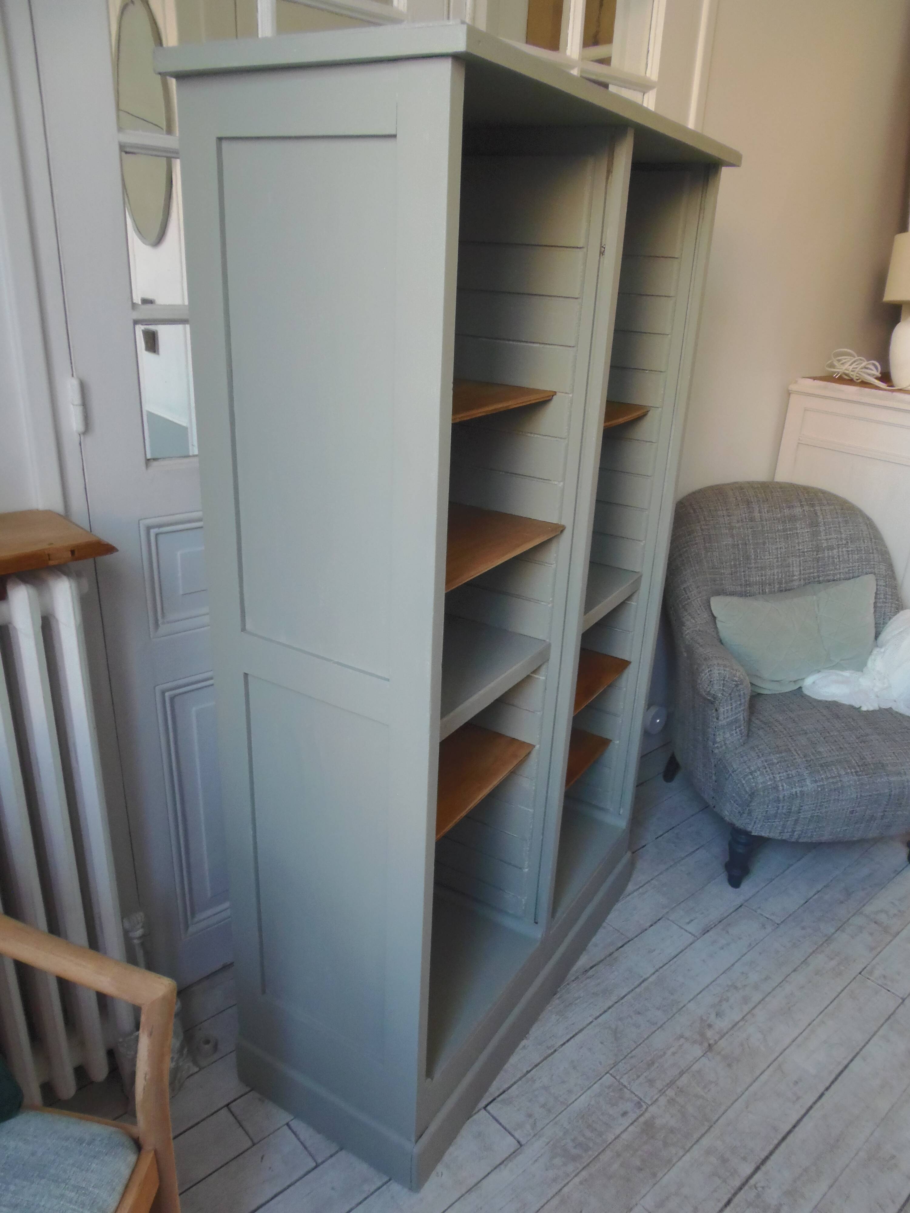 Vintage furniture transformed into a bookcase, verdigris patinated sideboard.