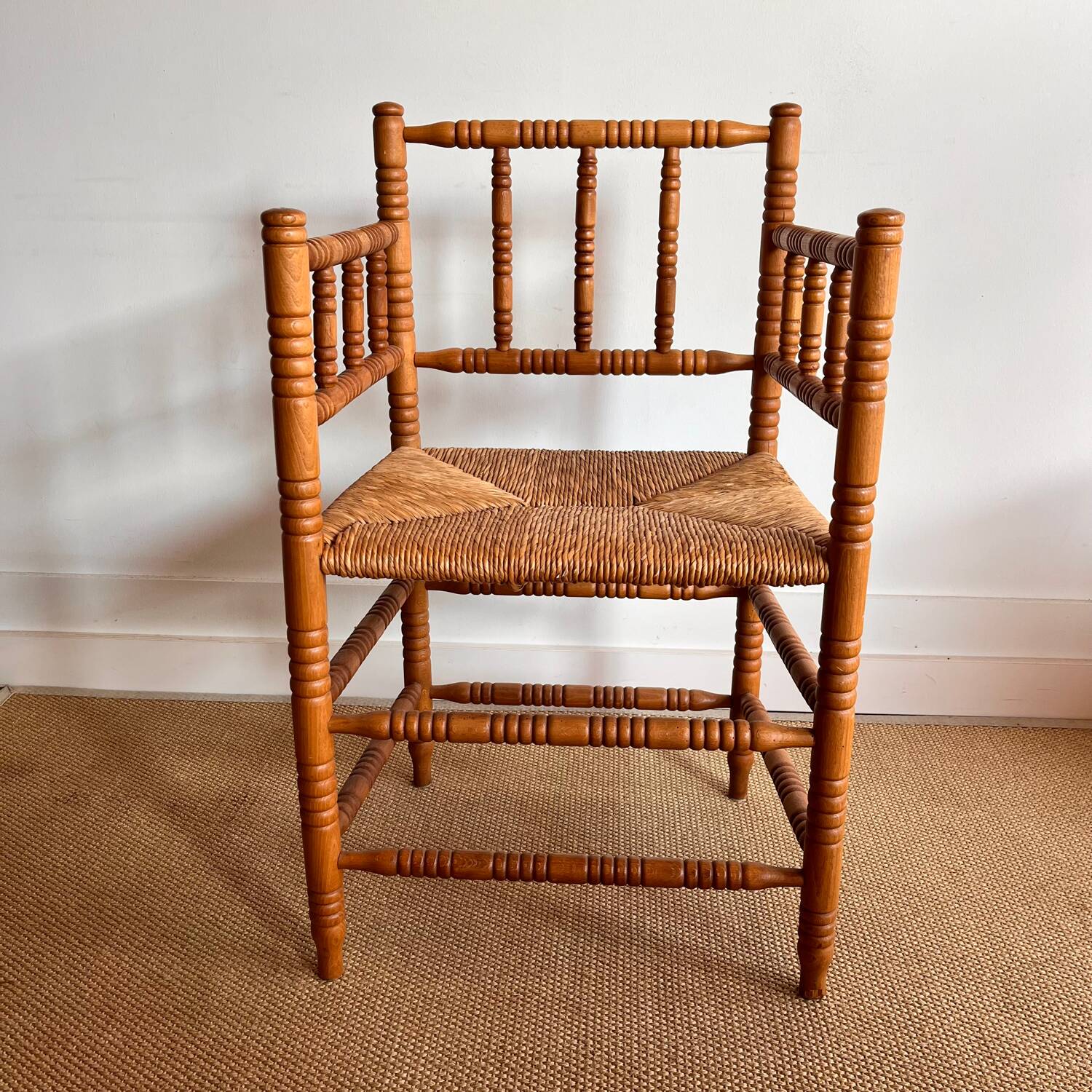 Antique Dutch bobbin chair with rush seating