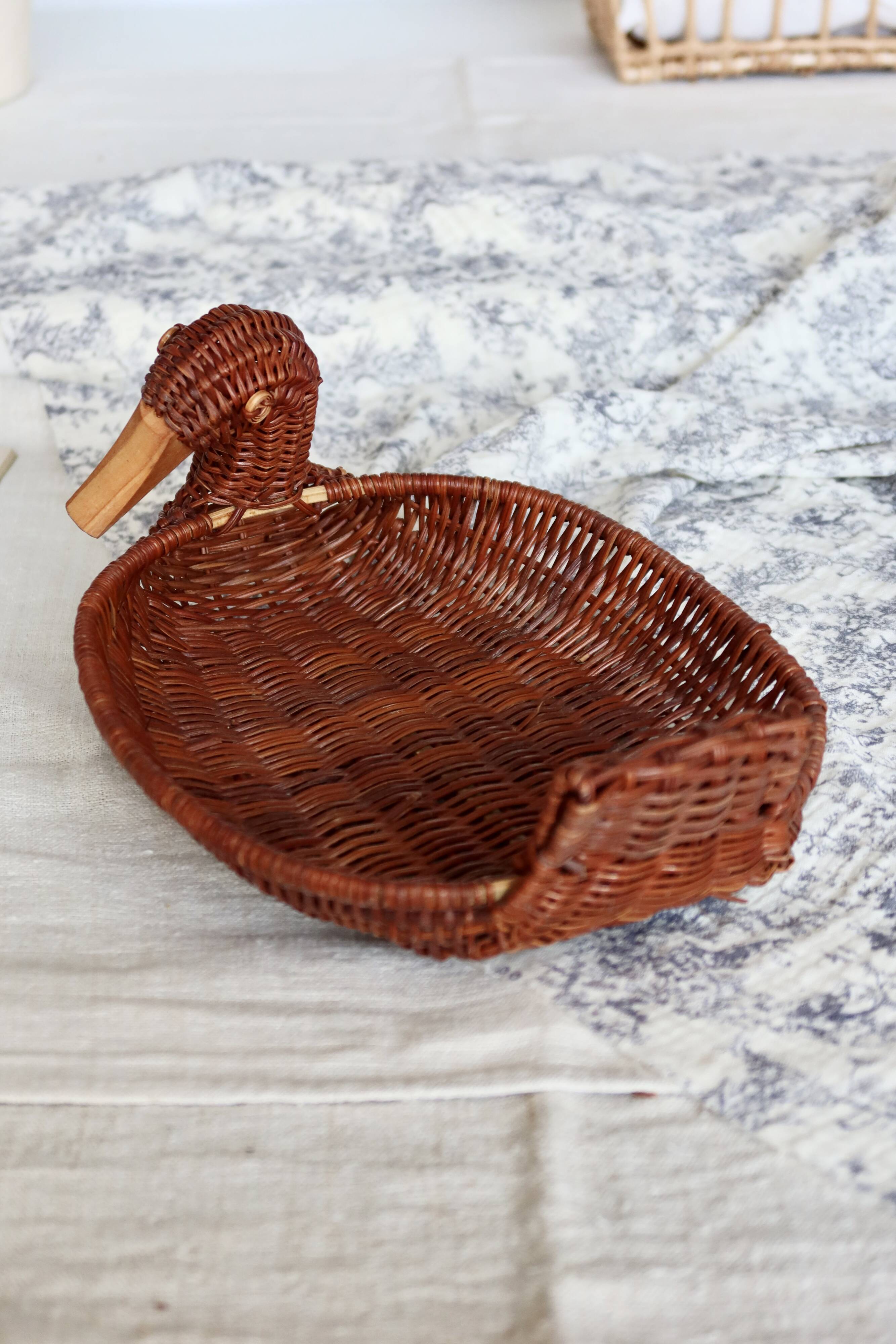 Vintage dark wicker duck basket