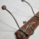 Antique wall-mounted coat rack in wood and metal with 4 hooks, 66 cm