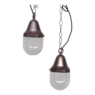 Pair of brass and clear glass industrial pendants