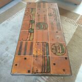 Table basse vintage en céramique – motif drakkar – design années 70