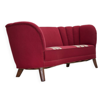 Canapé "Banana" danois 2 places des années 1960, en laine de mobilier, pieds en bois de chêne.