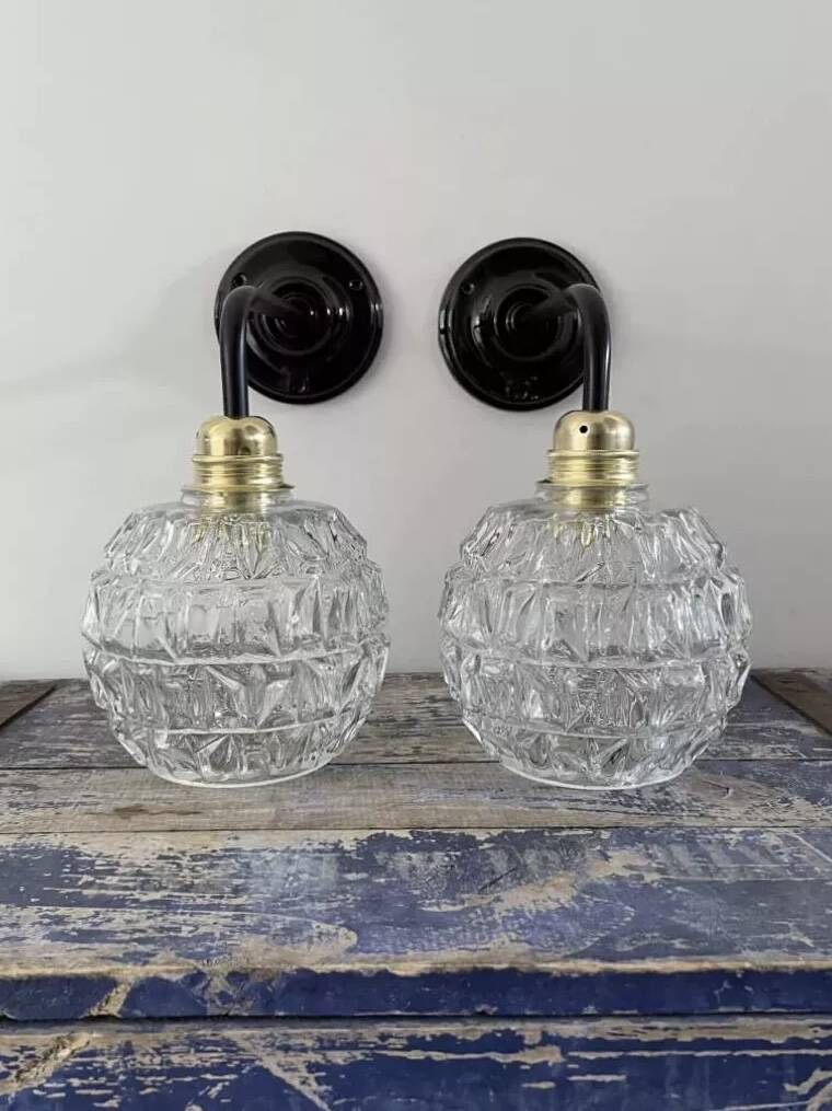 Pair of chiseled glass wall sconces