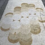 Large rug with flower decoration.