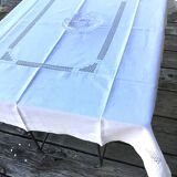 Rectangular tablecloth with embroidered openwork pattern